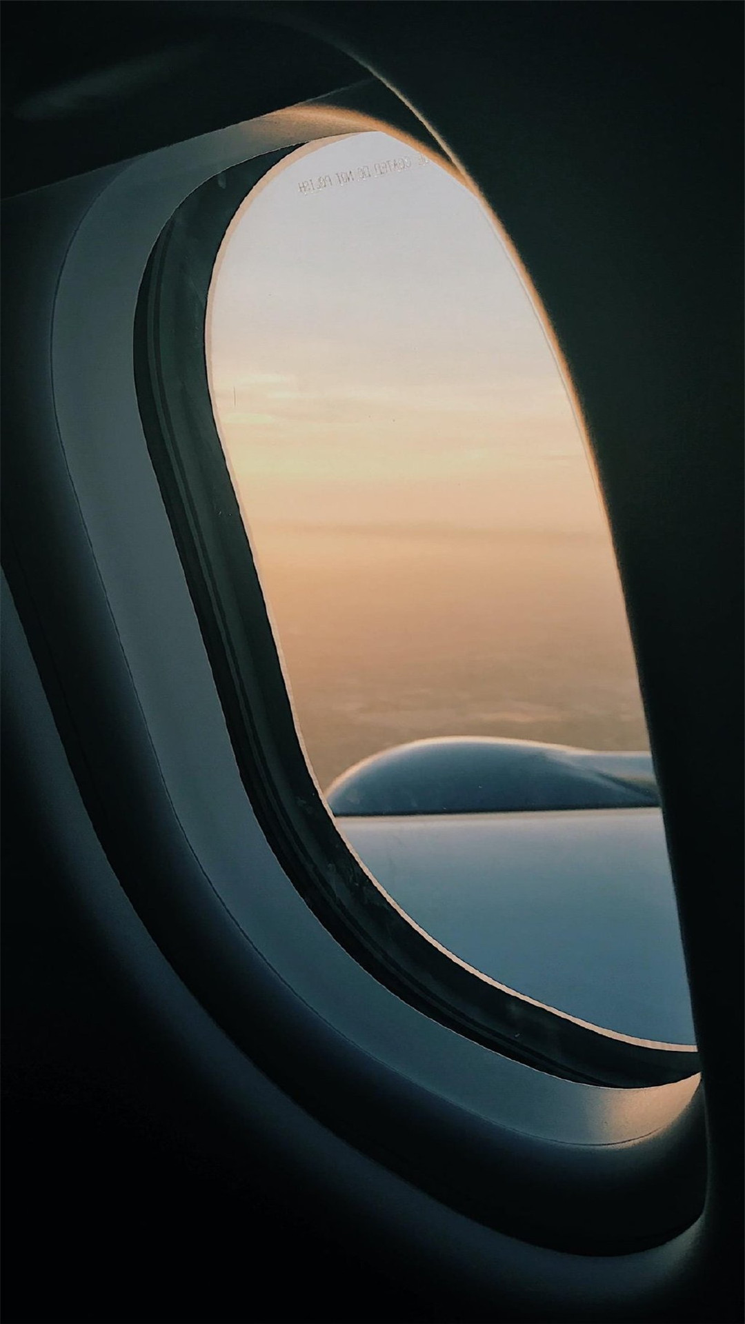 飞机窗外的风景高清手机壁纸